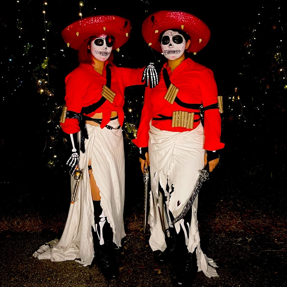 The book of life twin sisters (Adelita and Scardelita Sanchez) costumes